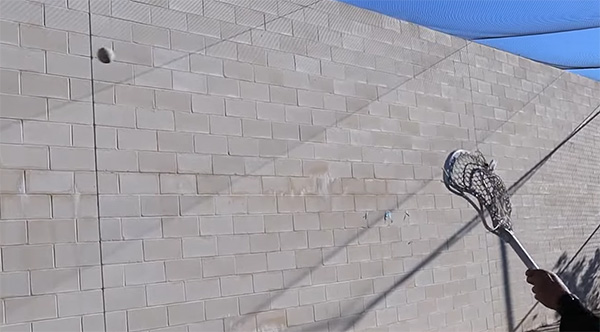 Breaking in a Lacrosse Stick on the Wall